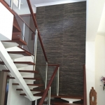 Broadbeach Waters Staircase - black grasscloth wallpaper