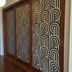 West End wallpaper installation on sliding doors - Florence Broadhurst Turnabouts hand screen printed wallpaper