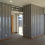 silver metallic wallpaper installation in penthouse Surfers Paradise