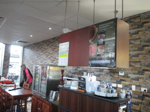 cafe wallpaper installation using slate lookalike wallpaper