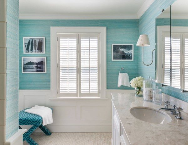 Aqua Grasscloth Wallpaper Compliments the White In This Coastal Bathroom